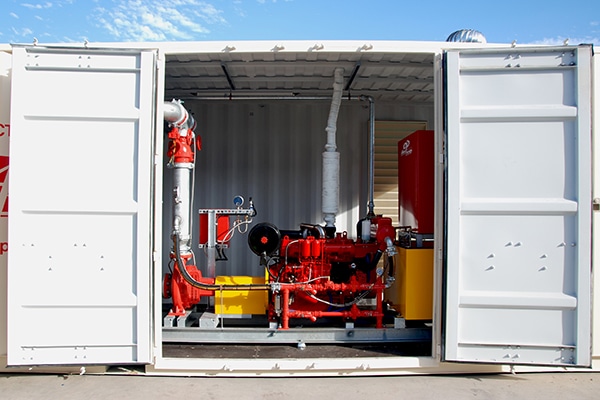 Container with fire pump inside