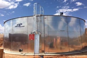 Circular galvanised steel tank on mine site